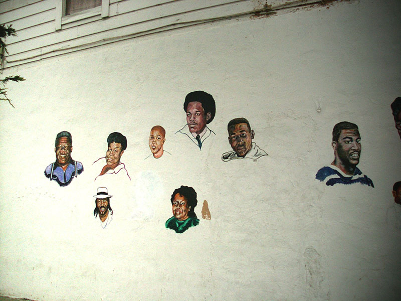 :: faces on a wall :: west oakland :: california ::